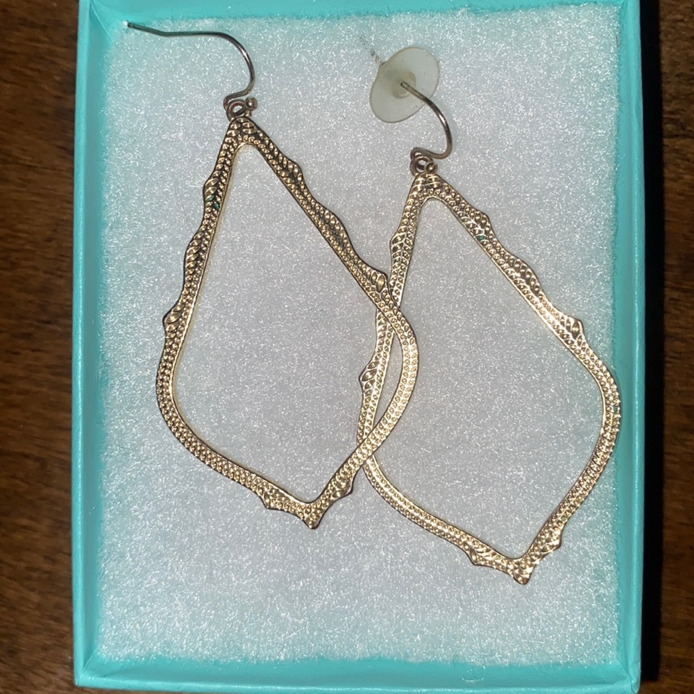 Open Kendra Scott earrings